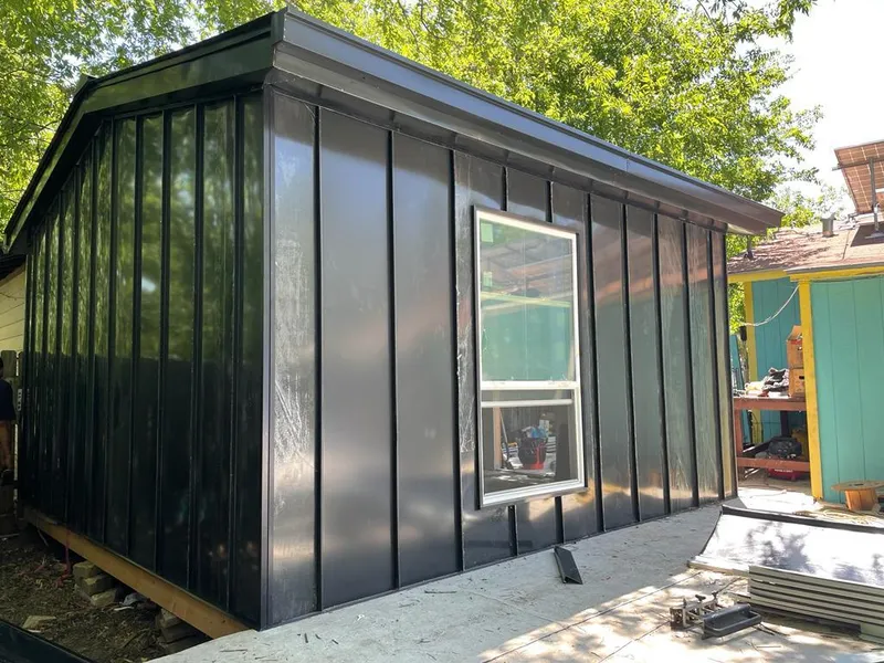 Black standing seam metal wall panels for Roof Inspection in Paradise